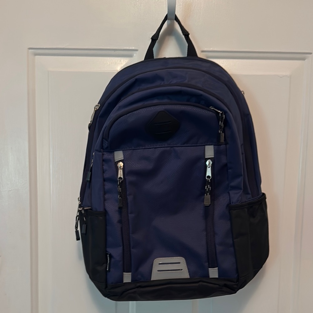 Eastsport Black and Blue Backpack Gently Used. No holes or tears!